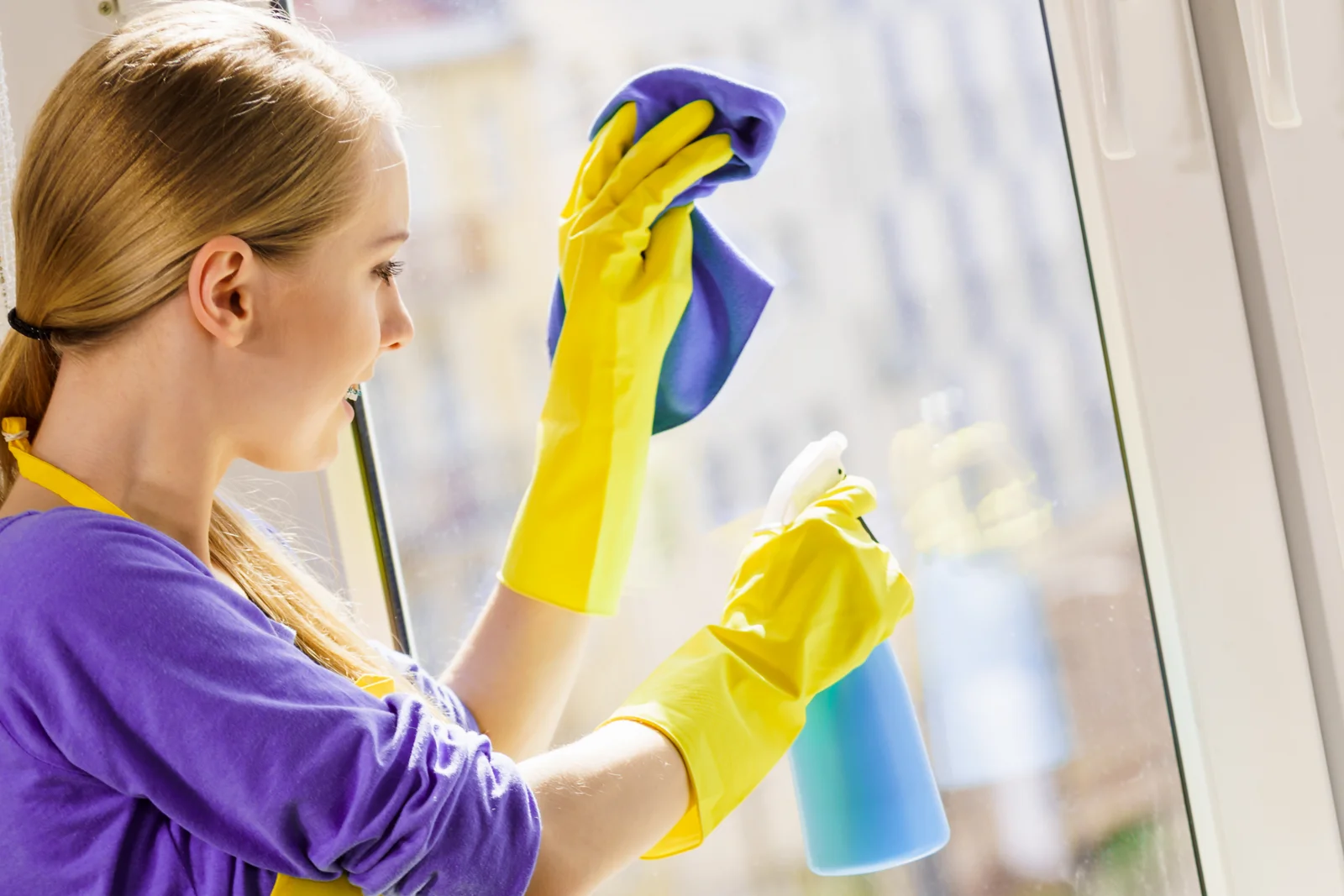 Illustrative photo of a window being wiped