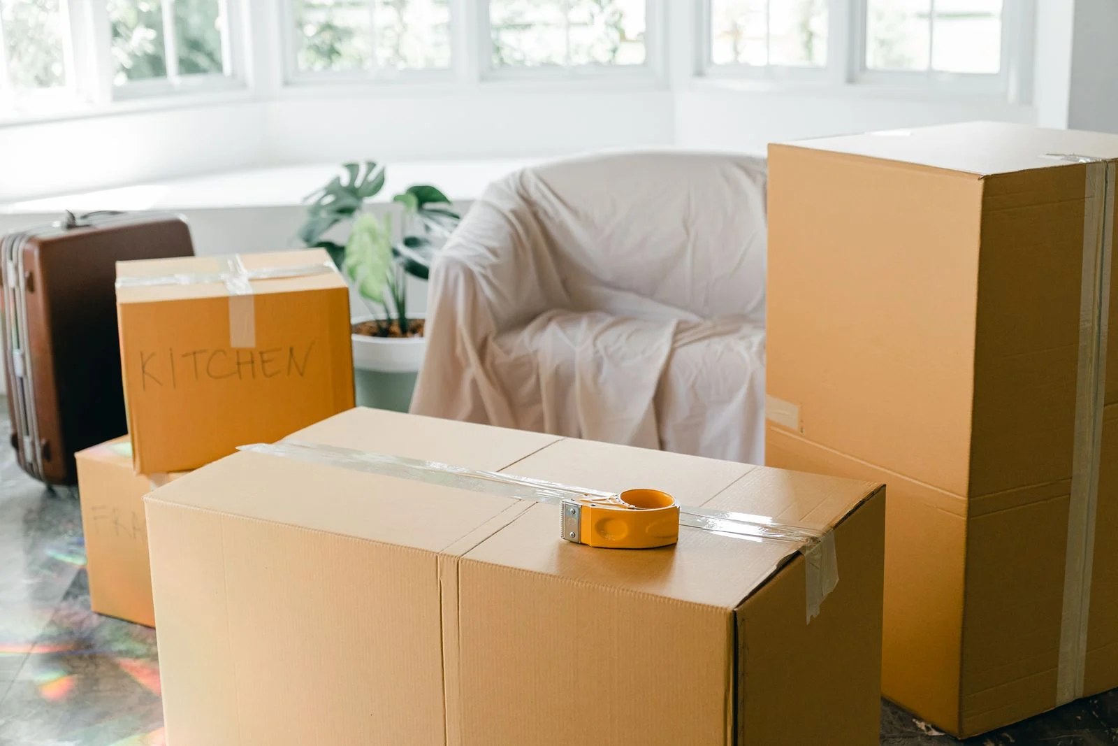 Moving boxes in a bright apartment ready for a new chapter